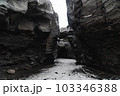 Canyon of black stone in the rock 103346388