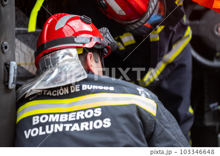 Car Crash Traffic Accident. Firefighters Rescue Injured Trapped Victims. Firemen give First Aid to Car Crash Traffic Accident. Firefighters Rescue Injured Trapped Victims. Firemen give First Aid to 103346648