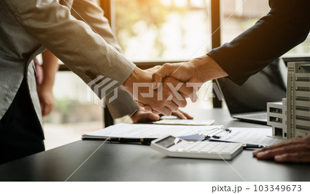 Salesman Hands On House Model , Small Toy House Small Mortgage Property insurance and concepts real estate. 103349673