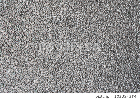 Beautiful stone background. Slow motion. Abstract texture and art design. Light gray background video. Gray cobblestones on the pavement. Macro image of bulbs and bubbles. Bright wallpaper. Close-up 103354384