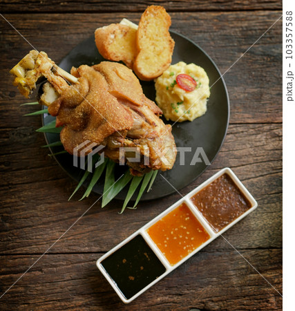 Crispy German Pork Knuckle with Beer Gravy Crispy German Pork Knuckle with Beer Gravy 103357588