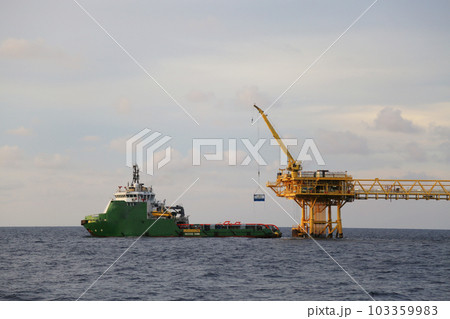 Offshore construction platform for production oil and gas. Oil and gas industry and hard work. Production platform and operation process by manual and auto function from control room. 103359983