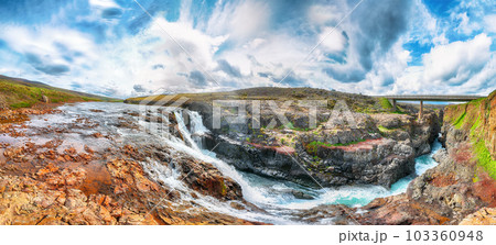 Breathtaking view of  Kolufossar waterfall at summer sunny day. 103360948
