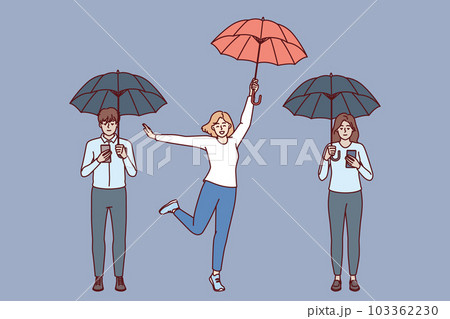 Digital addiction free woman near friends with umbrellas and phones using social media 103362230