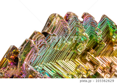 Macro of the mineral bismuth stone on a white background Macro of the mineral bismuth stone on a white background 103362629