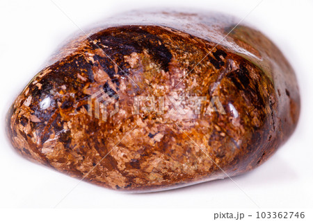 Macro mineral stone Bronze on white background Macro mineral stone Bronze on white background 103362746