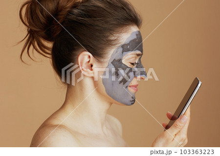 happy modern woman using smartphone 103363223