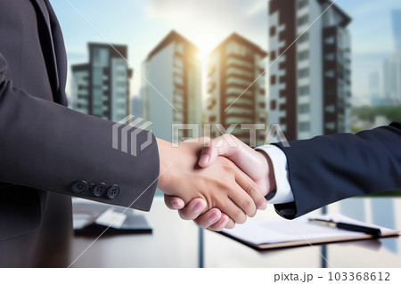 Two real estate agents, shaking hands, virtual tour, business partners sealing deal with handshake against stunning urban backdrop. Generative AI 103368612