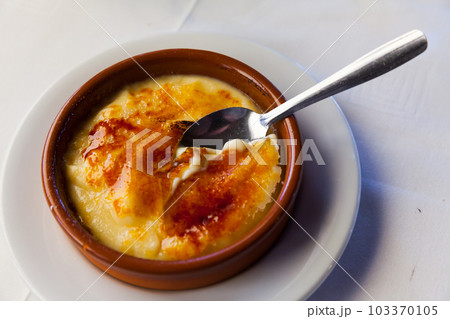 Tasty dessert catalana crema served with caramel crust, nobody Tasty dessert catalana crema served with caramel crust, nobody 103370105