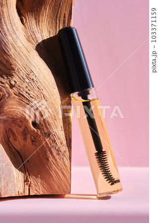 Cosmetic oil for the growth of eyebrows and eyelashes with a brush. 103371159