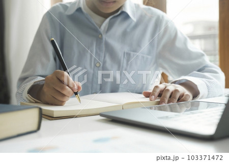 Close up female hands using computer laptop for online working. 103371472