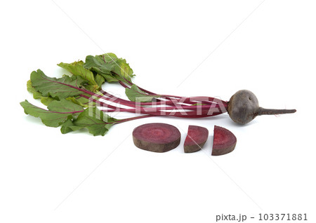 Sliced and whole fresh beetroot over whit 103371881