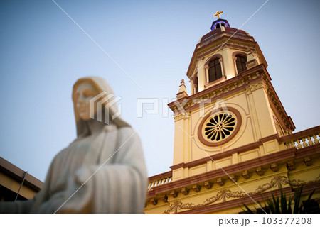 Santa Cruz Church illuminated at twilight , Historic Thai-Portuguese Neighborhood Dating Back to the Ayutthaya Period, in Bangkok, Thailand. 103377208
