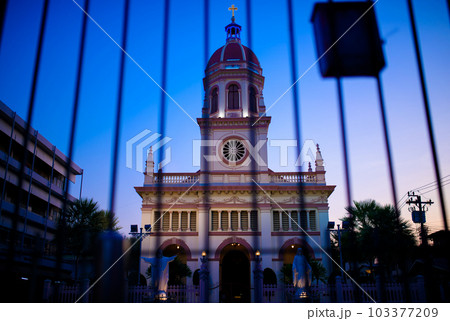 Santa Cruz Church illuminated at twilight , Historic Thai-Portuguese Neighborhood Dating Back to the Ayutthaya Period, in Bangkok, Thailand. 103377209