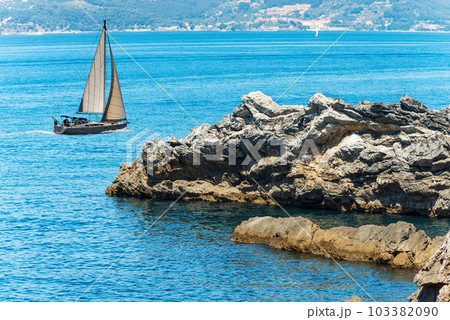 Sailing Boat and Rocky Coast in the Gulf of La Spezia - Liguria Italy 103382090