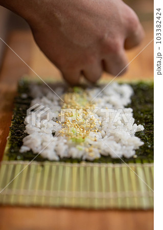 Sushi Chef Making Roll Sushi With Cucumber And Egg Stock Photo, Picture and  Royalty Free Image. Image 131623657.