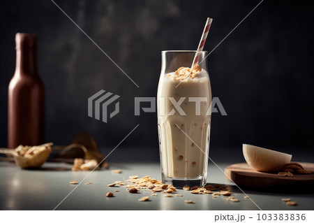 Delicious vanilla milkshake served in a tall glass, topped with whipped cream. AI generated. Delicious vanilla milkshake served in a tall glass, topped with whipped cream. AI generated. 103383836