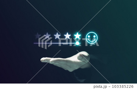 Businessman with smiley face emoticon on virtual touch screen 103385226