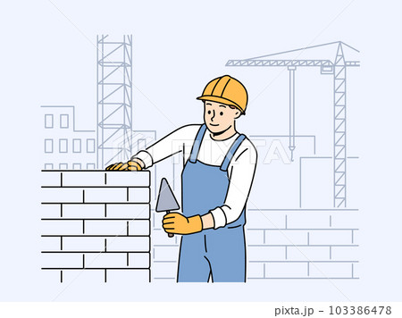 Male worker in uniform laying bricks Male worker in uniform laying bricks 103386478