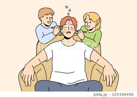 Naughty smiling children draw on sleeping father face Naughty smiling children draw on sleeping father face 103386490