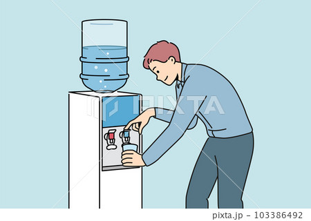 Man pouring water from cooler in office  Man pouring water from cooler in office  103386492