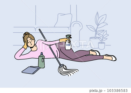 Tired lazy woman lying on floor while cleaning  103386583