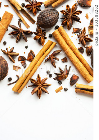 Dried star anise, cinnamon sticks and whole cardamon. Natural herbal spices seasoning collection. Dried star anise, cinnamon sticks and whole cardamon. Natural herbal spices seasoning collection. 103388262