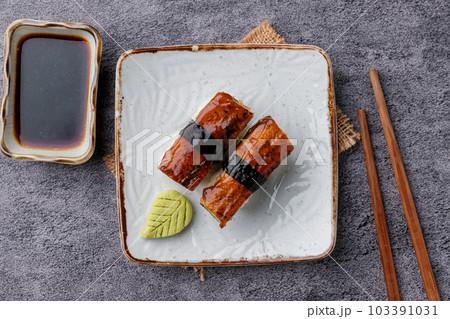 Unagi Sushi on White plate - Japanese Asian food style. Unagi Sushi on White plate - Japanese Asian food style. 103391031