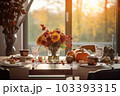 Seasonal table setting with pumpkins and flowers Seasonal table setting with pumpkins and flowers 103393315