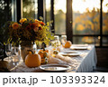 Seasonal table setting with pumpkins and flowers Seasonal table setting with pumpkins and flowers 103393324