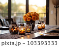 Halloween table setting with pumpkins and skulls Halloween table setting with pumpkins and skulls 103393333