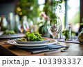 Romantic table setting with candles and flowers Romantic table setting with candles and flowers 103393337