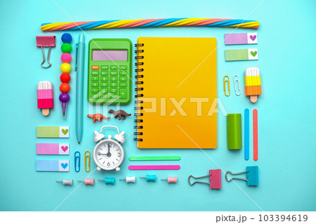 Different stationery.Top view of student table stationery and education supplies. Back to school. Different stationery.Top view of student table stationery and education supplies. Back to school. 103394619