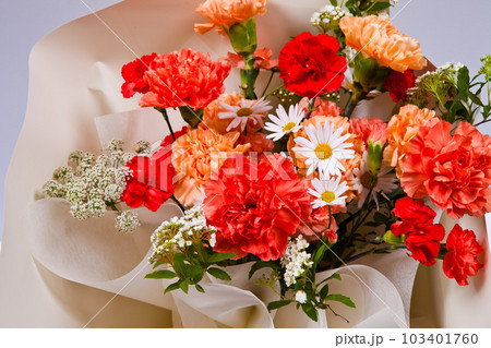 Bouquet of carnations and wildflowers on a white background	 103401760
