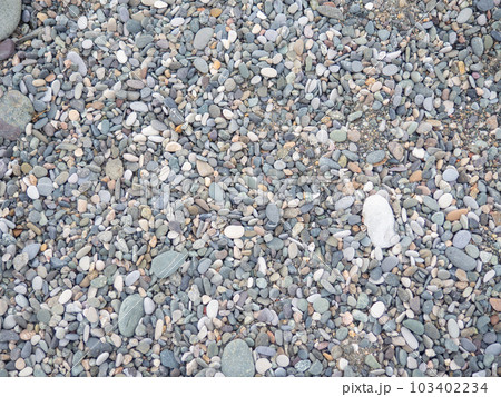 Big stones on the beach. Background from stones. Boulders on the seashore. Smooth cobblestones. Big stones on the beach. Background from stones. Boulders on the seashore. Smooth cobblestones. 103402234