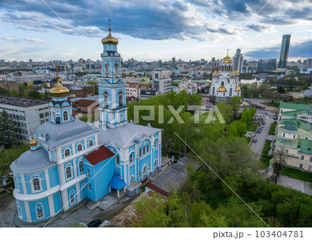 Summer Yekaterinburg, Temple of the Ascension and Temple on Blood in beautiful clear sunset. Summer Yekaterinburg, Temple of the Ascension and Temple on Blood in beautiful clear sunset. 103404781