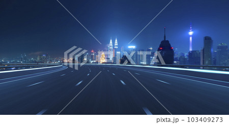 Highway overpass motion blur with city Highway overpass motion blur with city 103409273