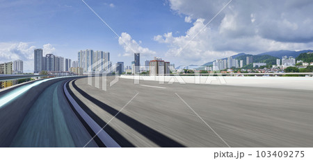 Highway overpass motion blur with city Highway overpass motion blur with city 103409275