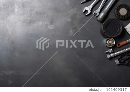 Auto mechanic's tools on grey stone table with copy space Auto mechanic's tools on grey stone table with copy space 103409317