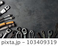 Auto mechanic's tools on grey stone table with copy space	 103409319