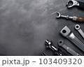 Auto mechanic's tools on grey stone table with copy space	 103409320