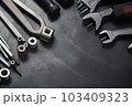 Auto mechanic's tools on grey stone table with copy space	 103409323