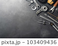 Auto mechanic's tools on grey stone table with copy space	 103409436