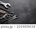 Auto mechanic's tools on grey stone table with copy space	 103409438