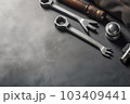 Auto mechanic's tools on grey stone table with copy space	 103409441