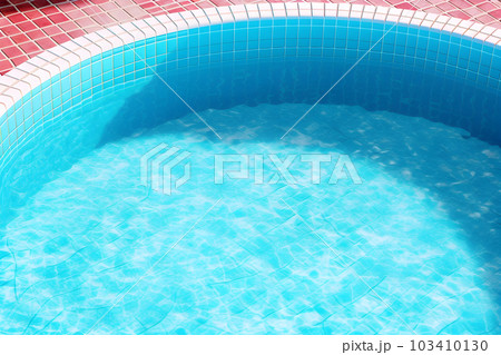Swimming pool without people in summer, sun shinning on blue water surface in pool, relaxing and fun activity in hot sunny day, Generative AI 103410130