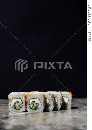Sai roll sushi with royal prawn, avocado, cream cheese, sesame. Sushi menu. Japanese food 103410583