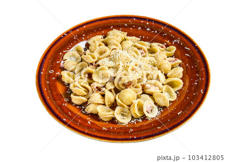 Pasta Orecchiette with pancetta, egg, hard parmesan cheese and cream sauce. Isolated on white background. 103412805
