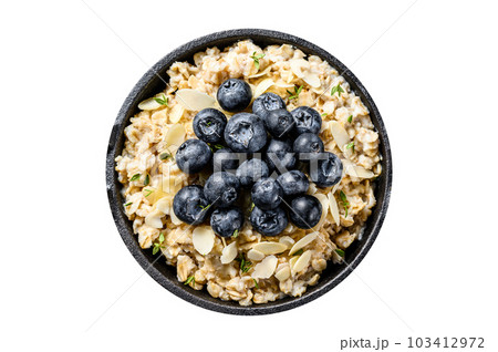 Oatmeal porridge with blueberries and almonds. Isolated on white background. 103412972