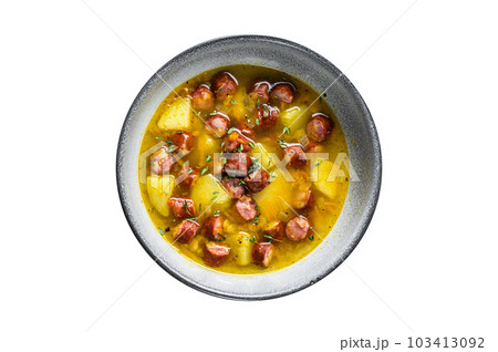 German Split pea soup with smoked sausages. Isolated on white background. 103413092